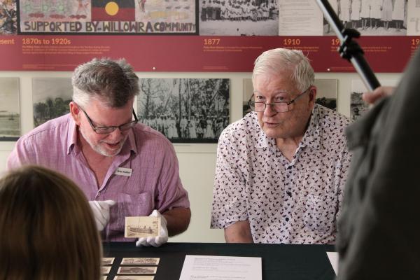 Donor John Bates, great-grandson of Richard Waton with Brian Hubber examining photos from the 1864-67 Escape Cliffs expedition